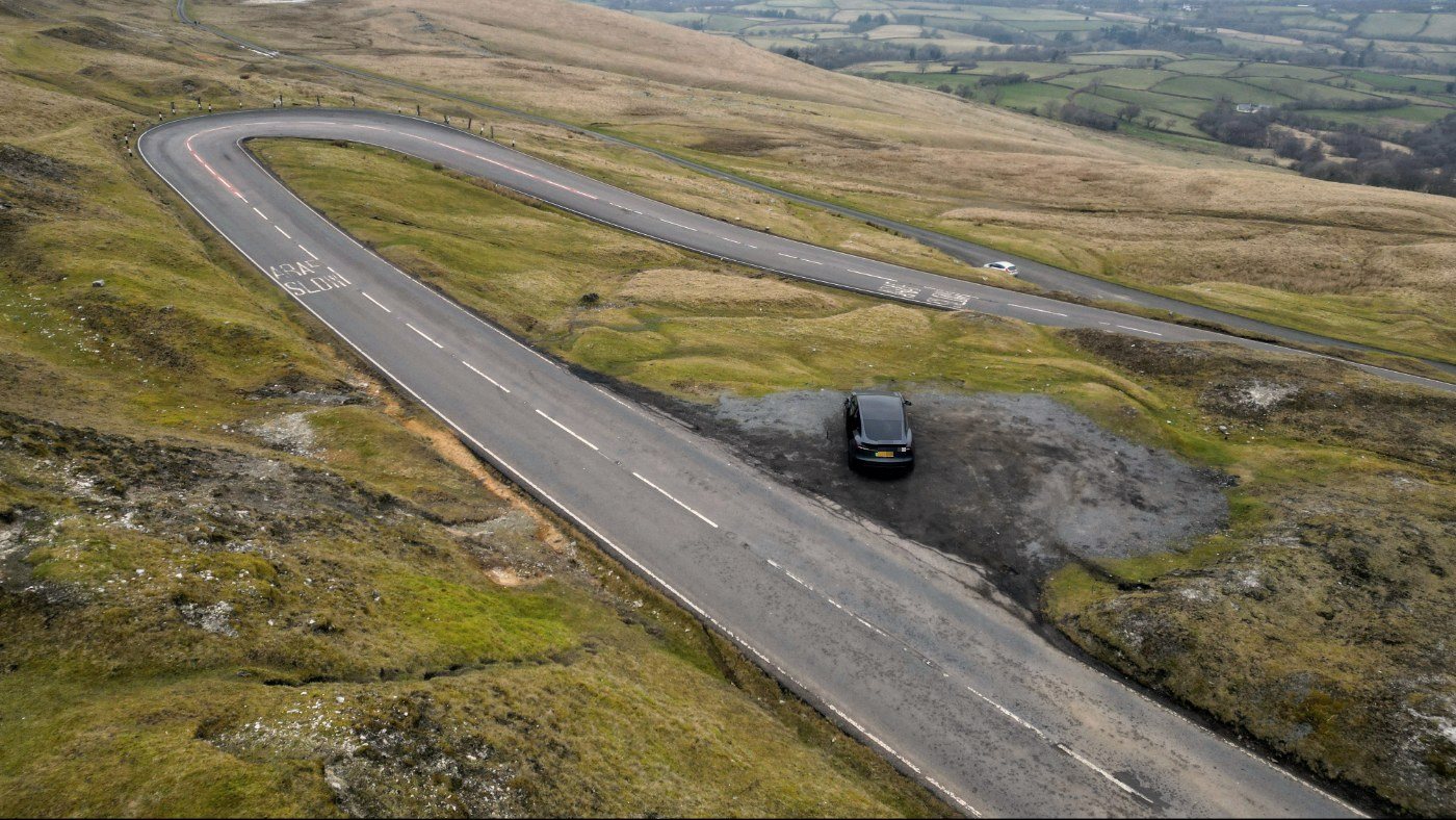 The A4069 Black Mountain Pass doubling back on itself across open Welsh moorland